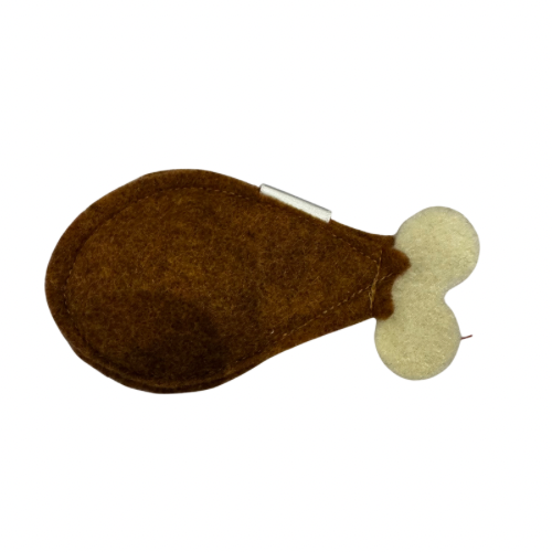 Brown and beige turkey cat toy shaped like a turkey lug on a white background