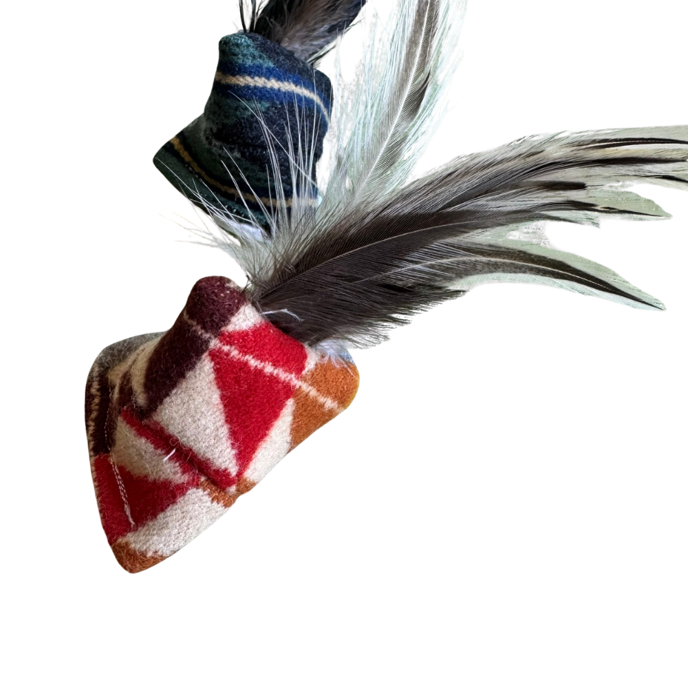 Feather cat toy with catnip designed for heavy play, pouncing, and bunny kicks. Plaid Wool