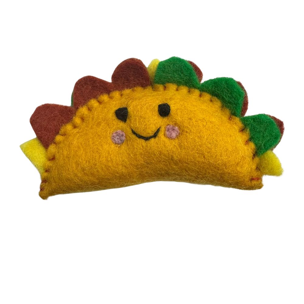 Handmade golden wool taco cat toy sprayed with premium catnip designed for bunny kicks and indoor cat enrichment.