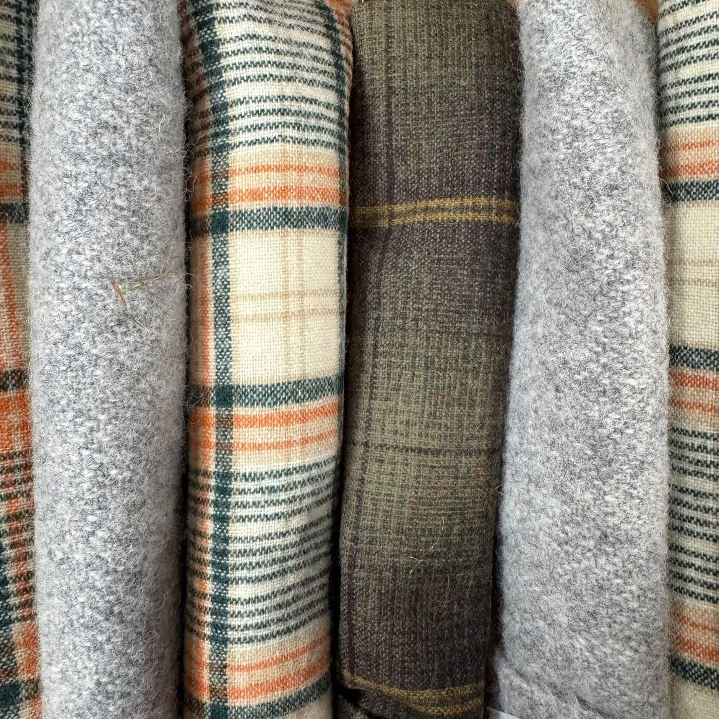 Upcycled Wool Kicker Cat Toy made from repurposed wool in stylish neutral tones. Filled with crinkle and our signature fresh, aromatic premium catnip. Made by CatnipTakeout.