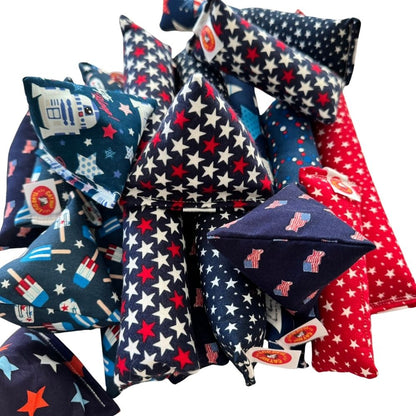 Patriotic catnip toys featuring Happy Sacks, Mini Kickers, and Kickers in festive Fourth of July stars, flags, and summer prints