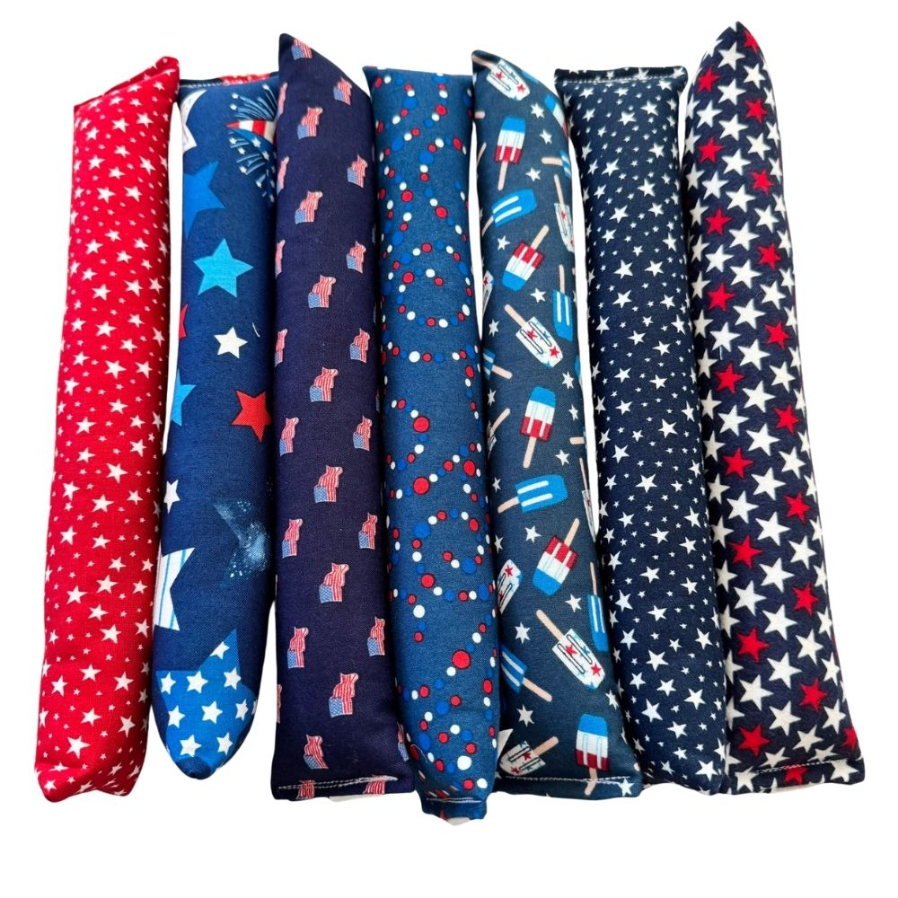 Handmade Kicker cat toys in patriotic stars, flags, fireworks, and popsicle prints filled with premium catnip