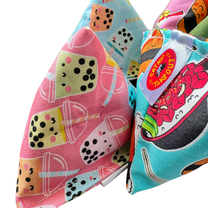 Pink and blue boba tea pyramid cat toys filled with catnip for batting and pouncing