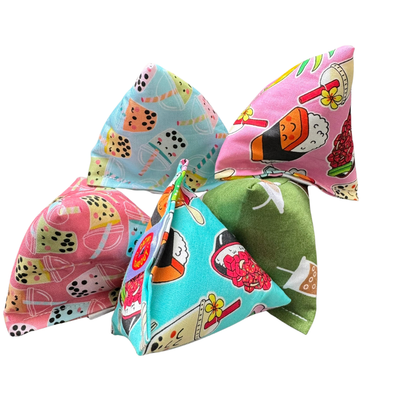 Boba tea and sushi themed pyramid cat toys filled with catnip for swatting and play
