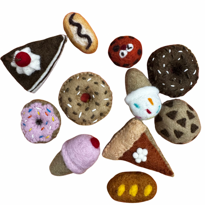 Collection of felt dessert toys on a white background 
