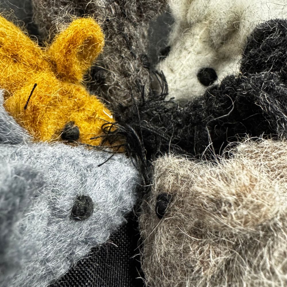 Close-up of textured fabric with natural colors and patterns