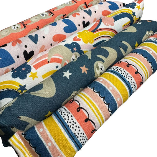 Sloth Happy Sack cat toy shown in five assorted sloth prints, pyramid shape made from cotton fabric, stuffed with signature premium catnip for tossing, batting, and interactive play. Made by CatnipTakeout.