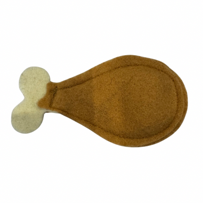 Brown and beige Turkey cat toy shaped like a drumstick on a white background