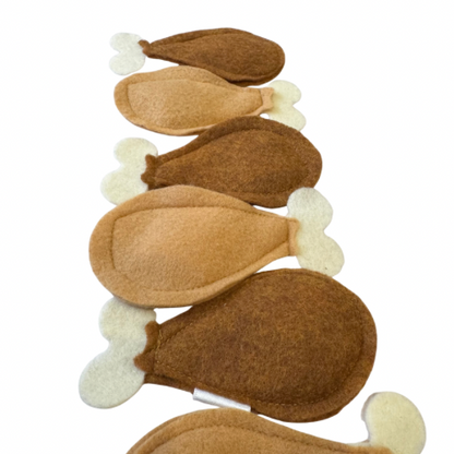 Set of brown and beige turkey leg cat catnip toys  on a white background