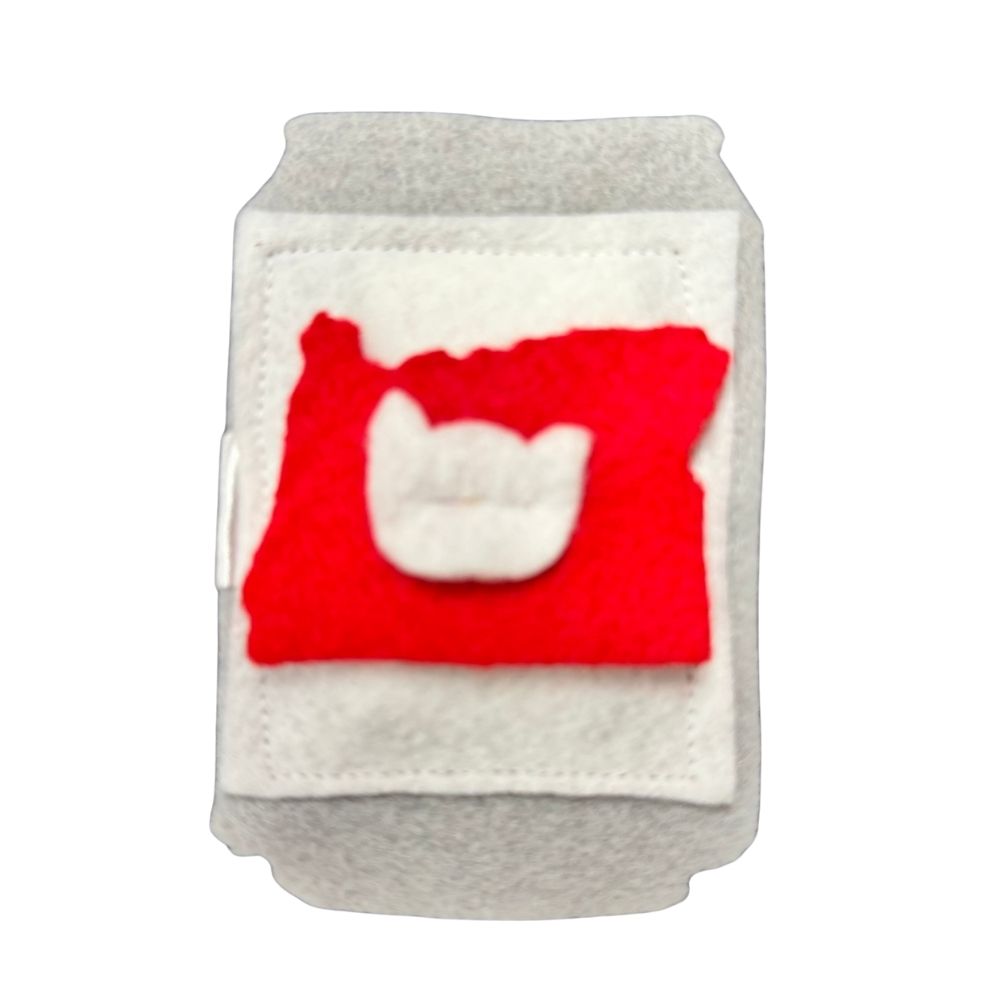 Beer can catnip toy in PNW Finest Rainier Beer style with red and white graphic patch on gray felt body