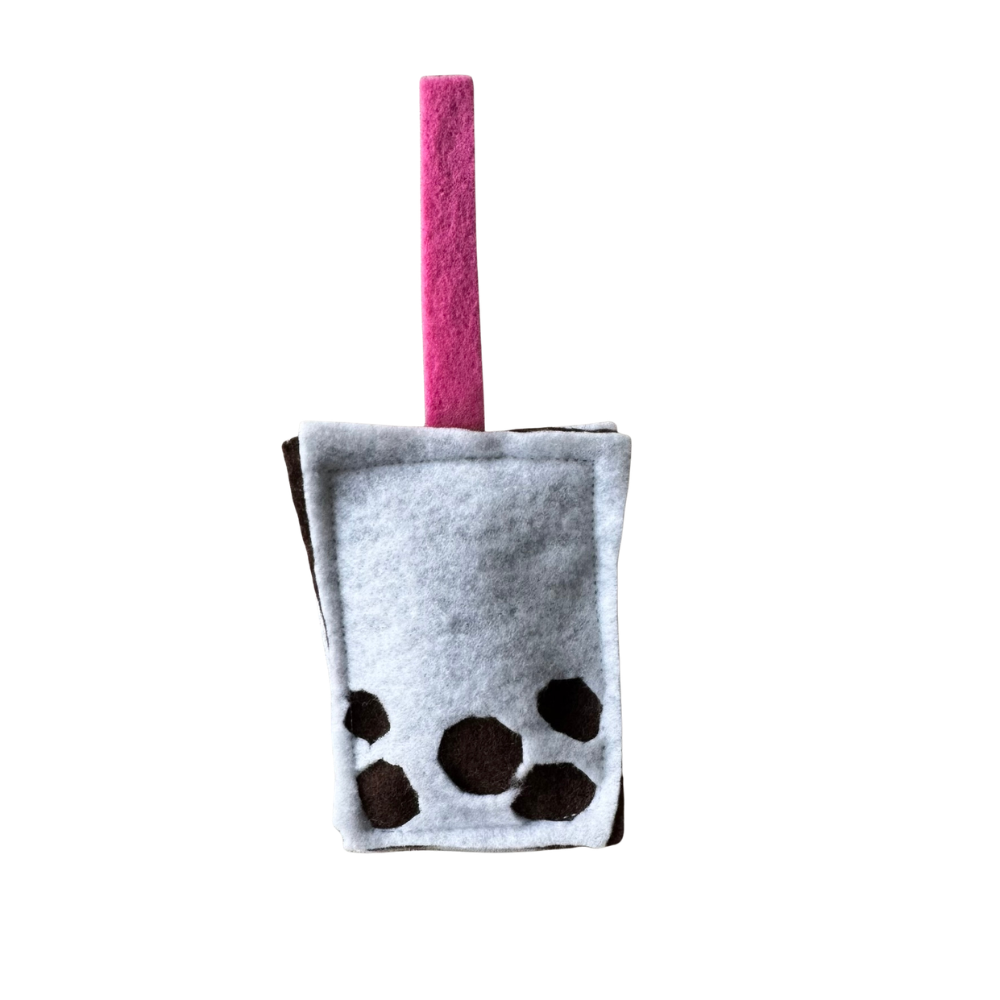 Bubble tea cat toy with pink straw for tap and chase play, batting and swatting