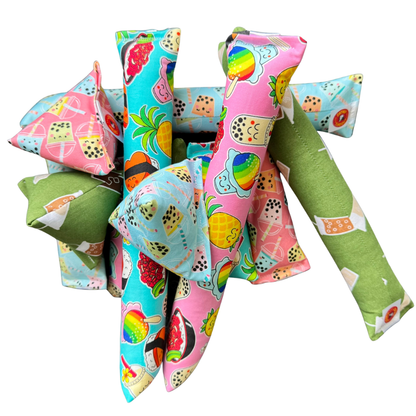 Boba tea kicker and pyramid cat toys filled with catnip for interactive play
