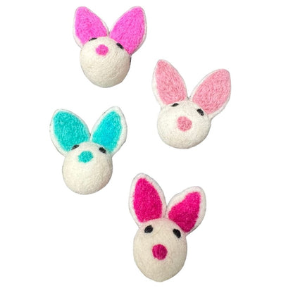 Group of bunny cat toys in teal and pink ear colors sprayed with catnip
