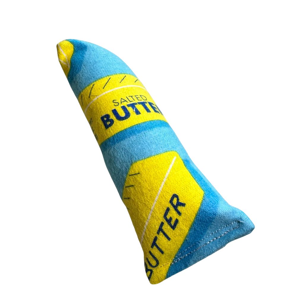 catniptakeout.jpg
Handmade butter fabric catnip mini kicker cat toy designed for batting, bunny kicks, and energetic interactive play by CatnipTakeout