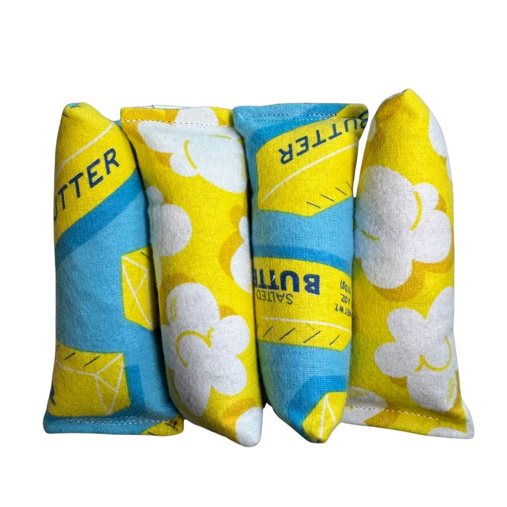 Handmade catnip mini kicker cat toys in popcorn and butter fabric, soft flannel toys sized for batting, bunny kicks, and energetic interactive play by CatnipTakeout