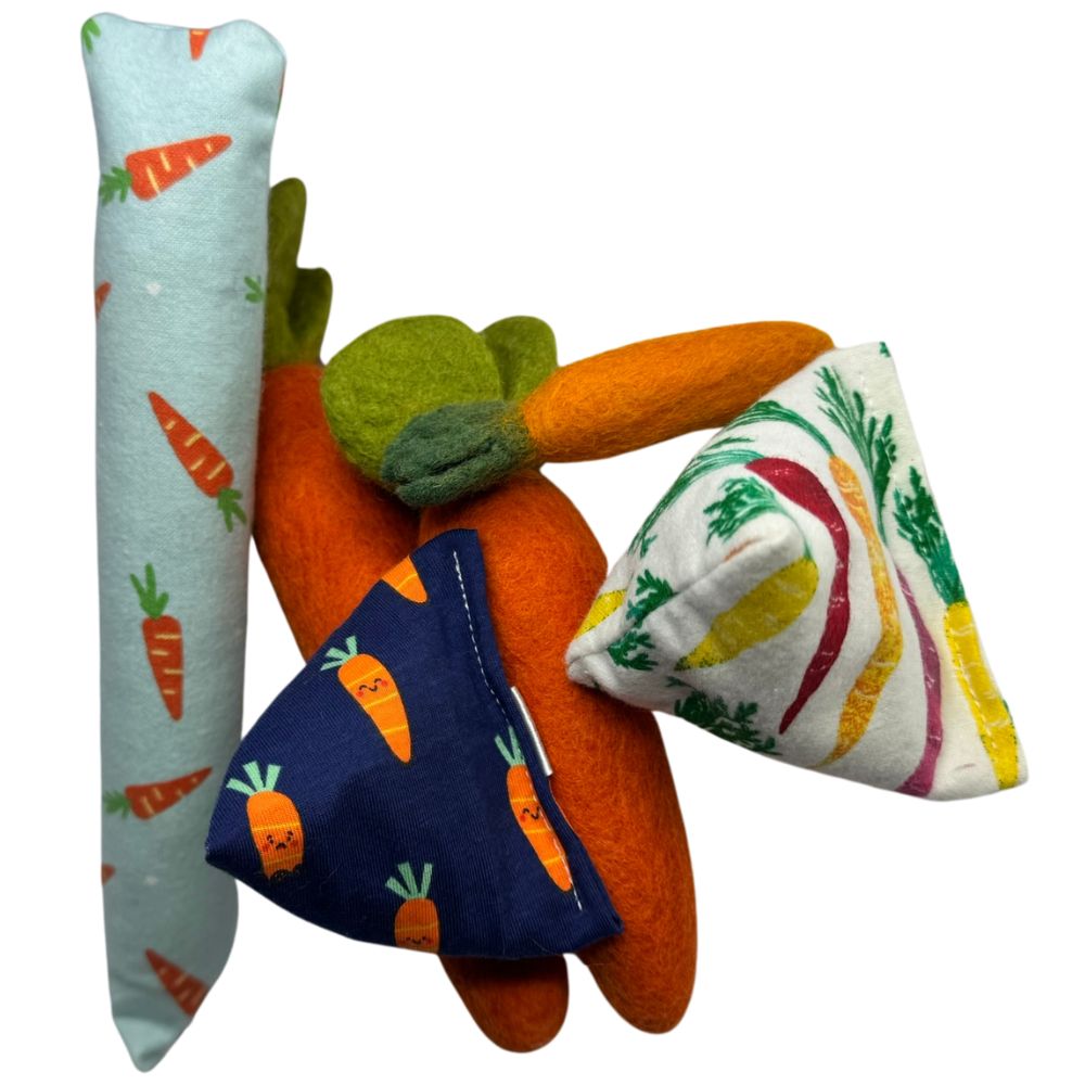 Carrot cat toy collection with wool carrots, kicker, Happy Sack, and mini carrot cat toys
