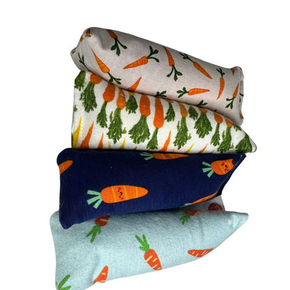 Four carrot cat toy Mini Kickers stacked in a row, sized for chasing, carrying, and grab-and-go play