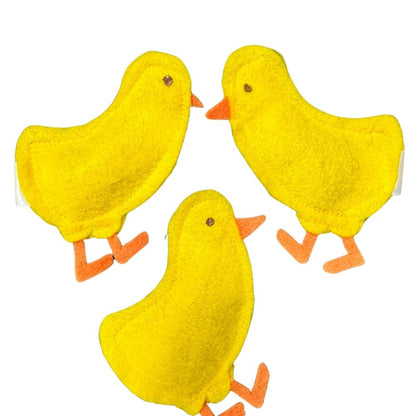 Group of yellow felt chick cat toys filled with catnip designed for batting, chasing and bunny kicking play
