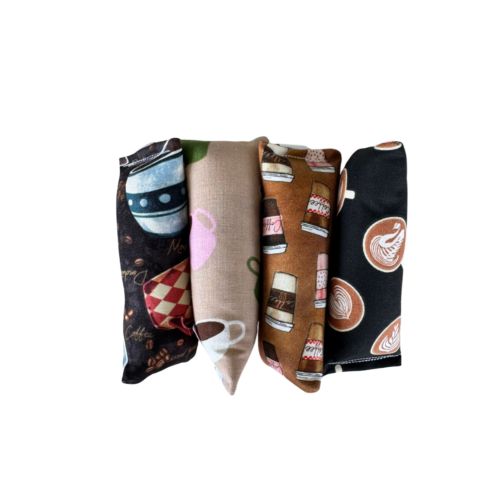 Coffee cat toy Mini Kickers lined up together to show long shapes for chase, carry, and kick play