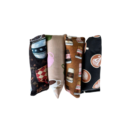 Coffee cat toy Mini Kickers lined up together to show long shapes for chase, carry, and kick play