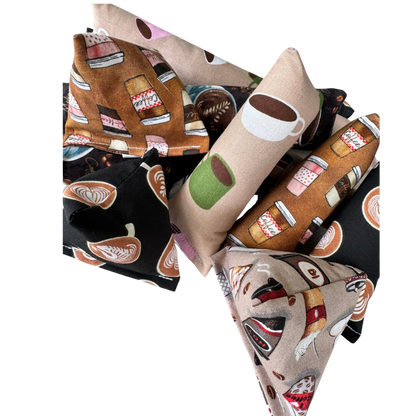 Close-up of coffee cat toys in different shapes for tossing, carrying, and bunny kick play