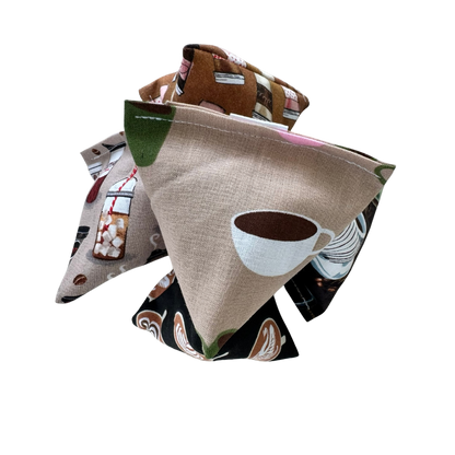 Stacked coffee cat toy Happy Sacks arranged for swatting, batting, and quick pounce play