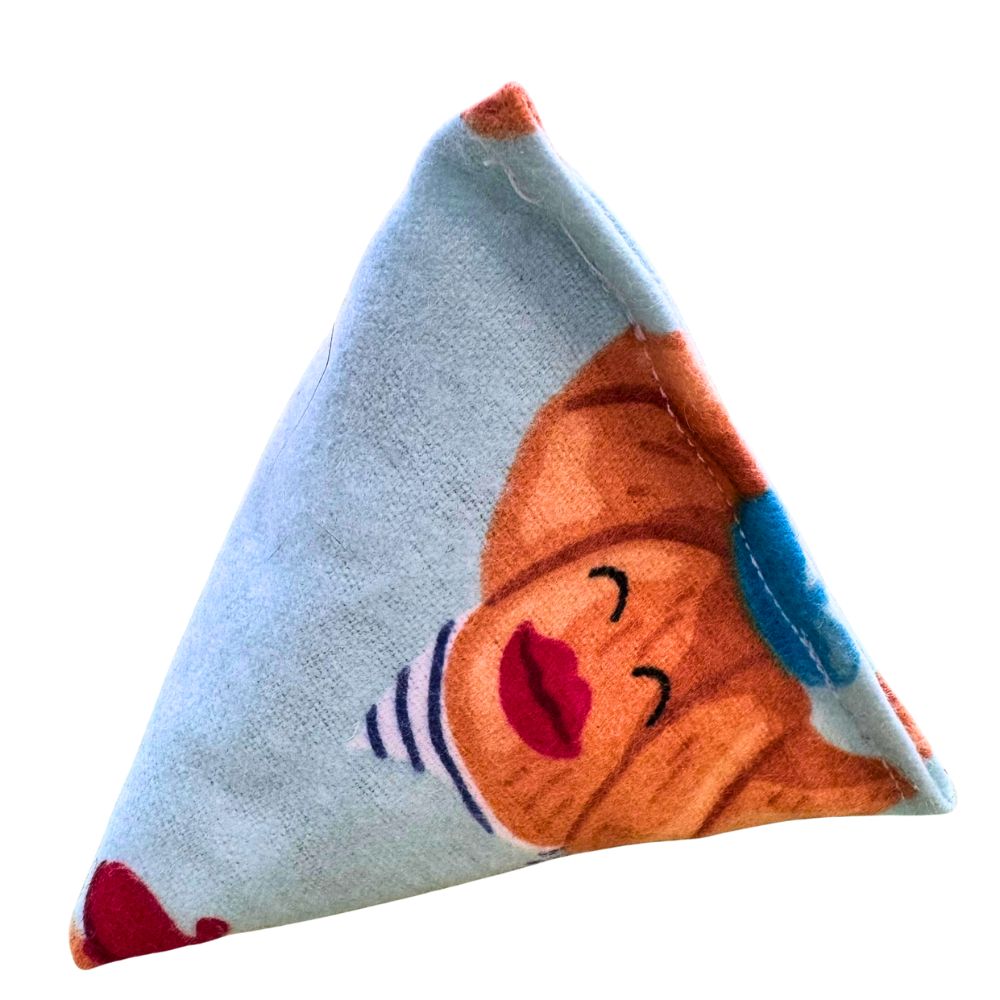 CatnipTakeout Croissant Happy Sack cat toy in a pyramid shape featuring a light blue bakery-themed fabric with illustrated croissants, expressive pastry faces, and soft stitched seams, designed for kitten-friendly batting, tossing, and independent catnip play