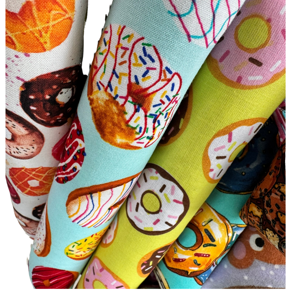 Close-up of donut cat toys in different shapes showing options for chasing carrying and kicking