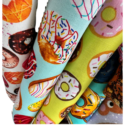 Close-up of donut cat toys in different shapes showing options for chasing carrying and kicking