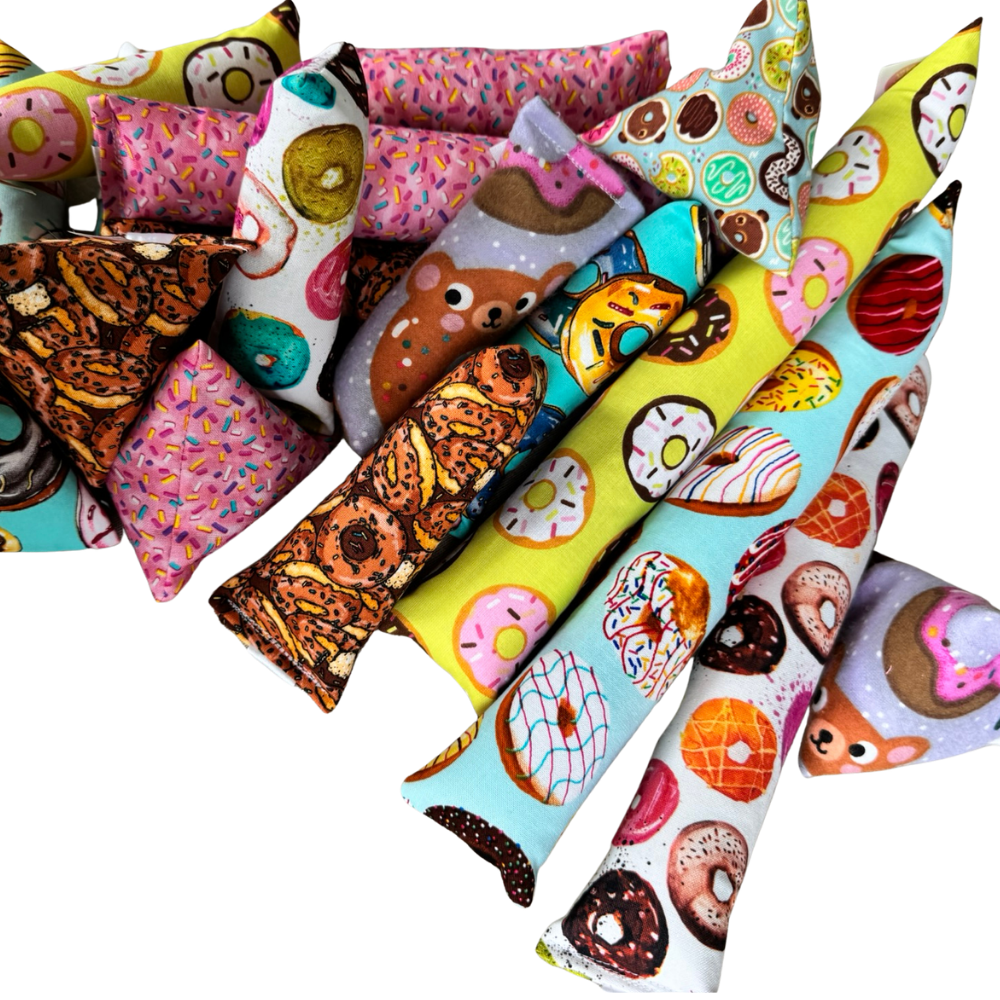Donut cat toys grouped together in Happy Sack Mini Kicker and Kicker shapes for active interactive play