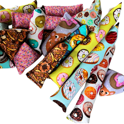 Donut cat toys grouped together in Happy Sack Mini Kicker and Kicker shapes for active interactive play