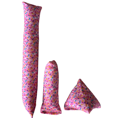 Pink donut cat toy shown in Kicker Mini Kicker and Happy Sack shapes for size and play comparison