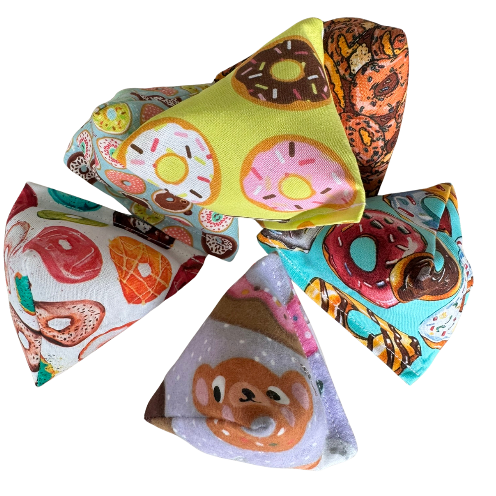 Donut cat toy Happy Sacks grouped together in several donut-inspired assortments for batting and toss play