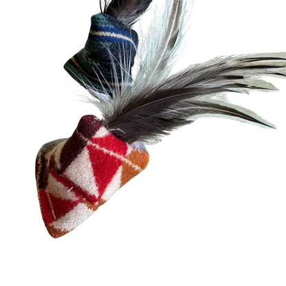 Feather cat toy with catnip designed for heavy play, pouncing, and bunny kicks. Plaid Wool