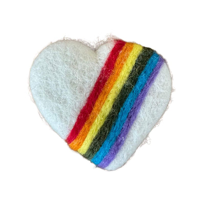 White heart-shaped felt toy with a rainbow stripe, sprayed with catnip for cats