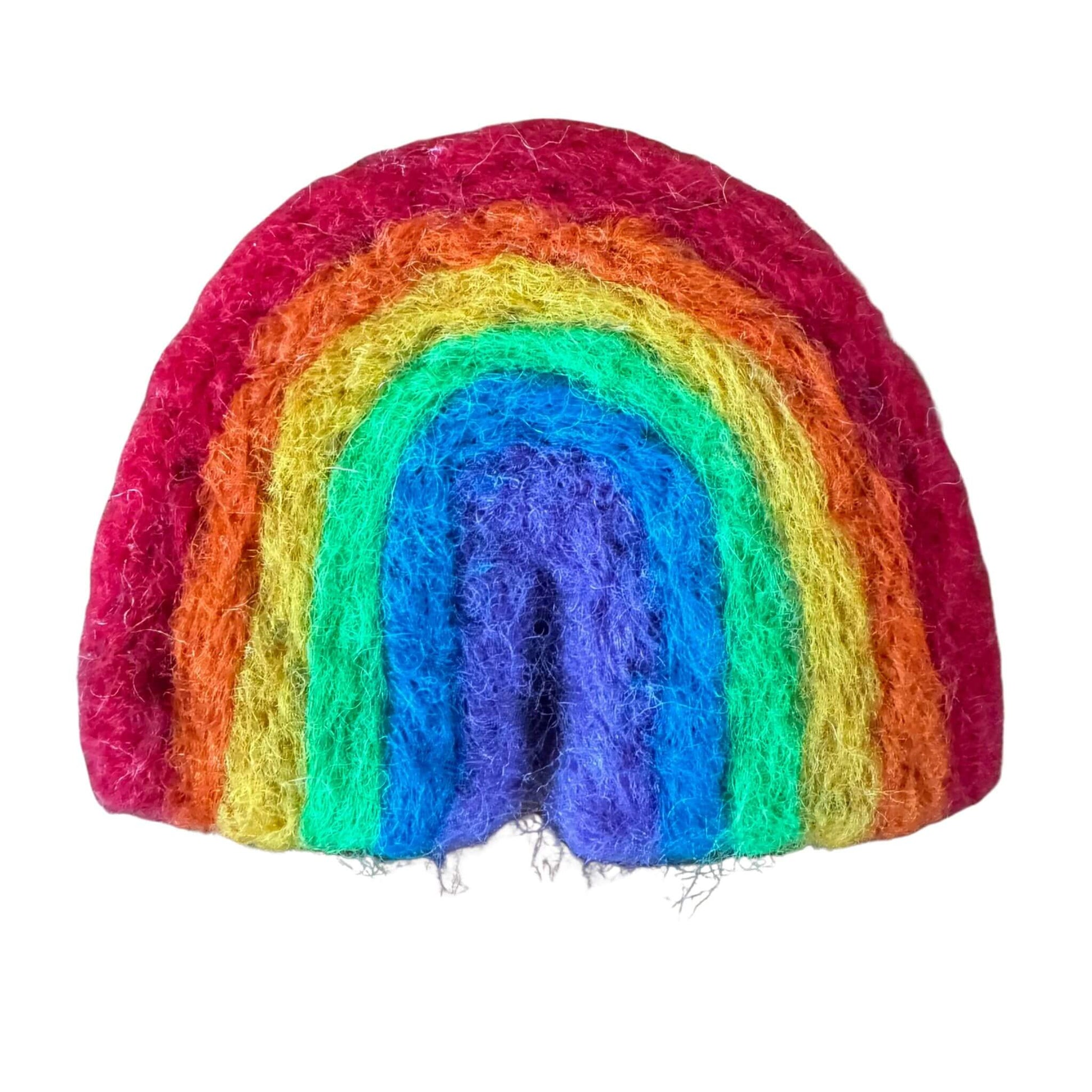 Close-up of a rainbow-shaped felt toy designed for cat play