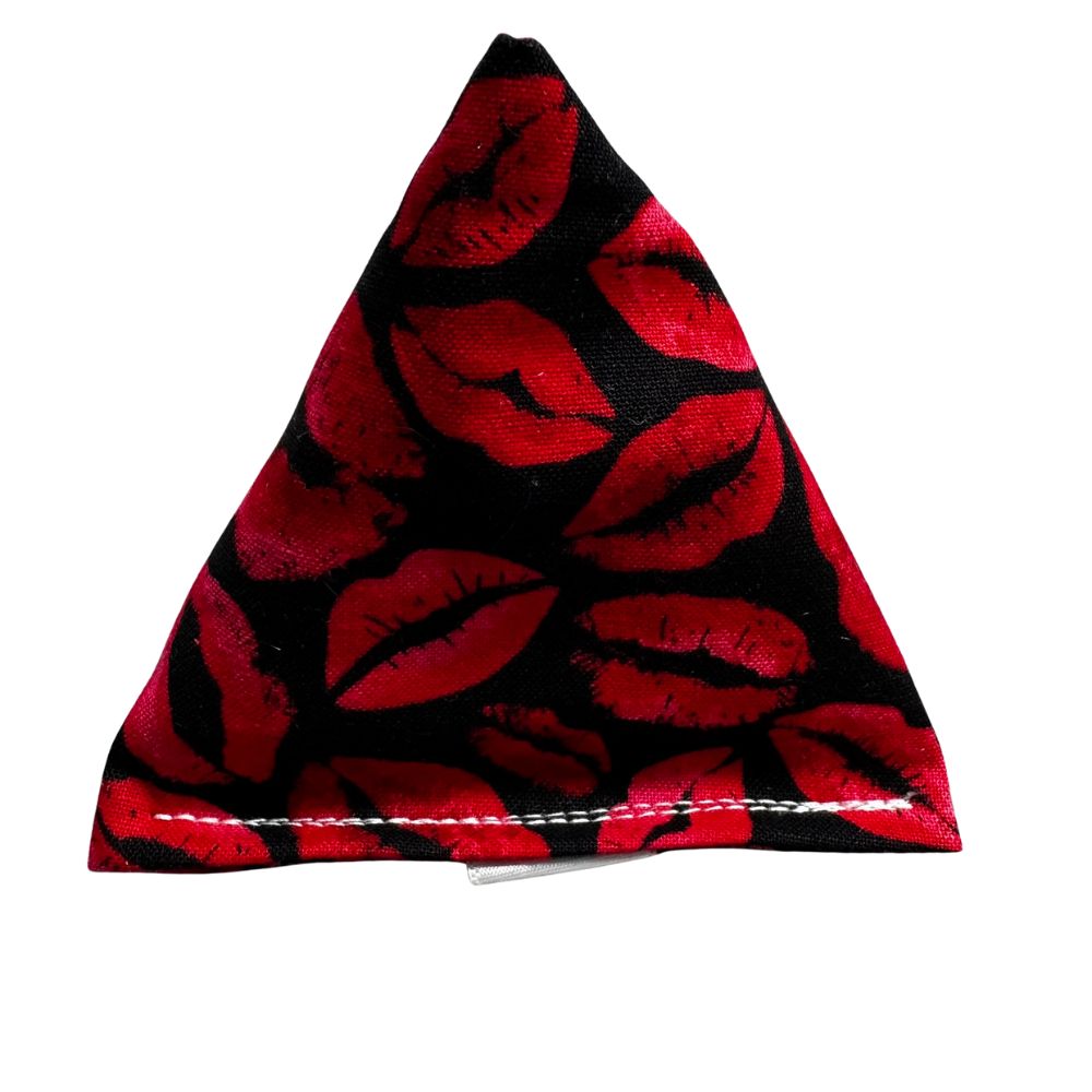 Individual photo of a handmade Valentine kiss Happy Sack cat toy with a pyramid shape, filled with signature premium catnip. Made by CatnipTakeout.