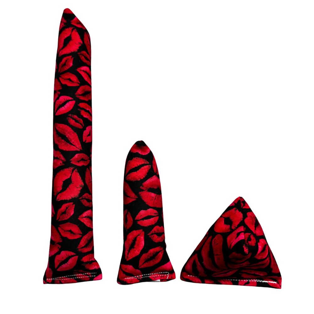 Group photo of handmade Valentine kiss cat toys including a kicker, mini kicker, and Happy Sack, filled with signature premium catnip. Made by CatnipTakeout.