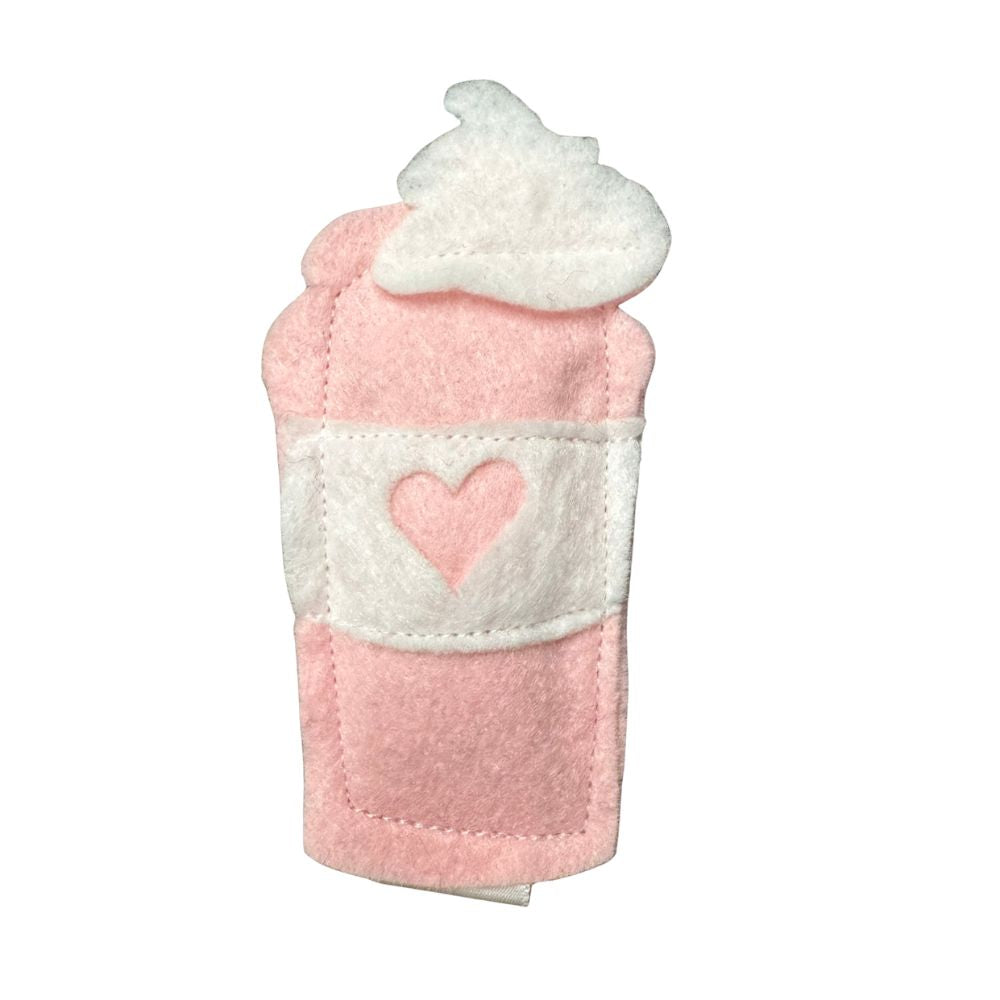 Close-up of handmade pink felt latte cat toy with white whipped cream top and stitched heart, filled with premium catnip. Made by CatnipTakeout.