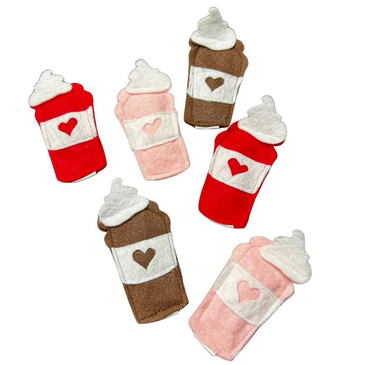 Single handmade coffee brown felt latte cat toy shown upright with white sleeve and heart detail, filled with premium catnip. Made by CatnipTakeout.