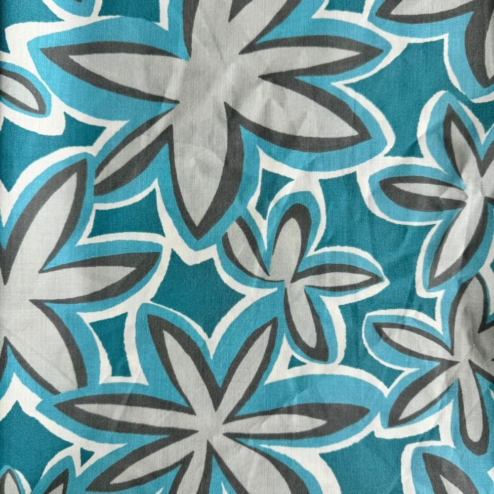 Aqua Lagoon Maui Vibes cat toy print with aqua background and gray and cream retro plumeria flowers, used for handmade premium catnip toys.
