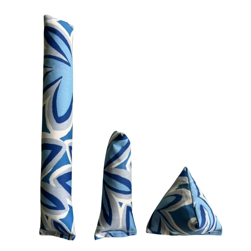 Maui Vibes Blue Breeze print cat toys shown as Kicker, Mini Kicker, and Happy Sack in light blue, navy, and white retro plumeria fabric.