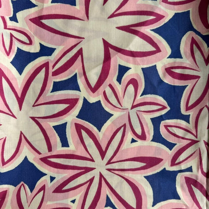 Navy Orchid Maui Vibes cat toy print with cream background and pink and navy retro plumeria flowers, used for handmade catnip toys for bored cats.