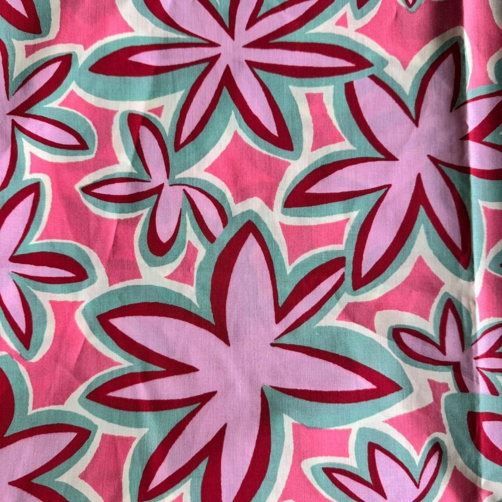 Pink Hibiscus Maui Vibes cat toy print with pink background and mint and red retro plumeria flowers, used for handmade premium catnip toys.