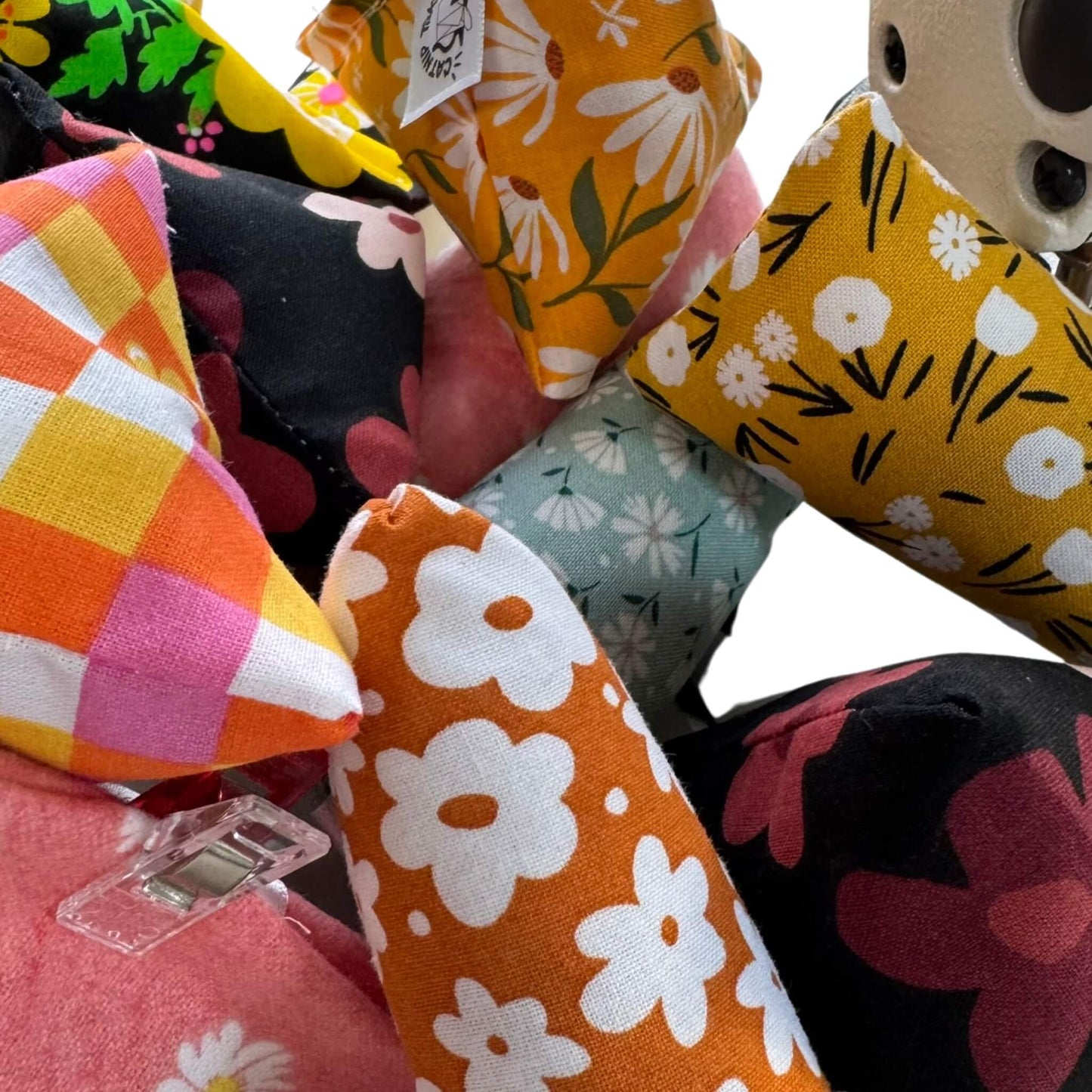 Mini Easter-themed cat toy with floral and gingham spring fabrics. Filled with crinkle material and our signature fresh, aromatic premium catnip. Made by CatnipTakeout.