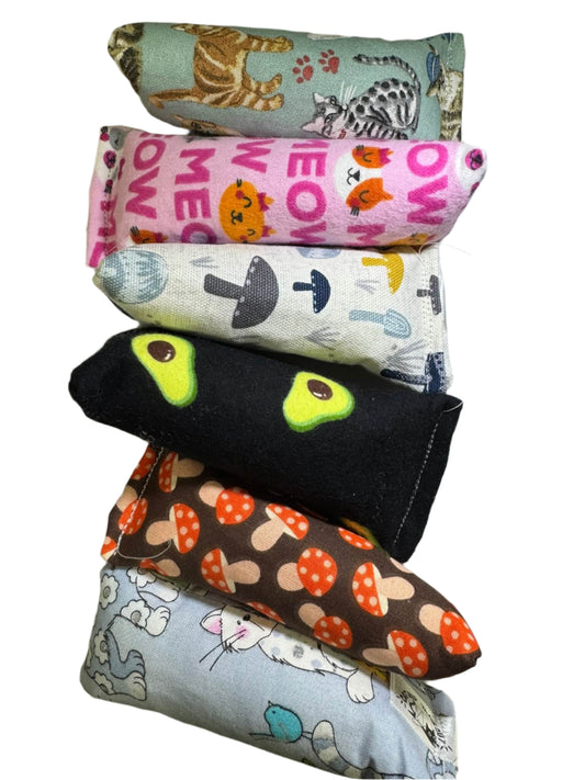 Mini kicker cat toy with catnip and surprise prints like cats, tacos, and mushrooms. Available with or without crinkle. Made by CatnipTakeout.