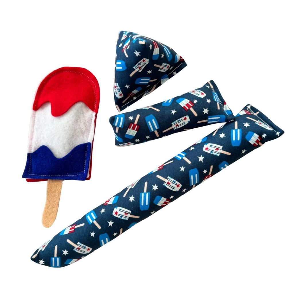 Drip Patriotic Rocket Pop cat toy with patriotic Happy Sack, Mini Kicker, and Kicker catnip toys.