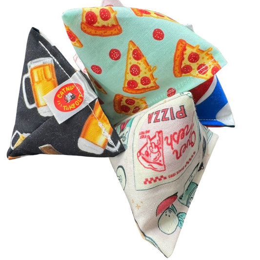 Stacked pizza cat toys showing multiple fabric variations