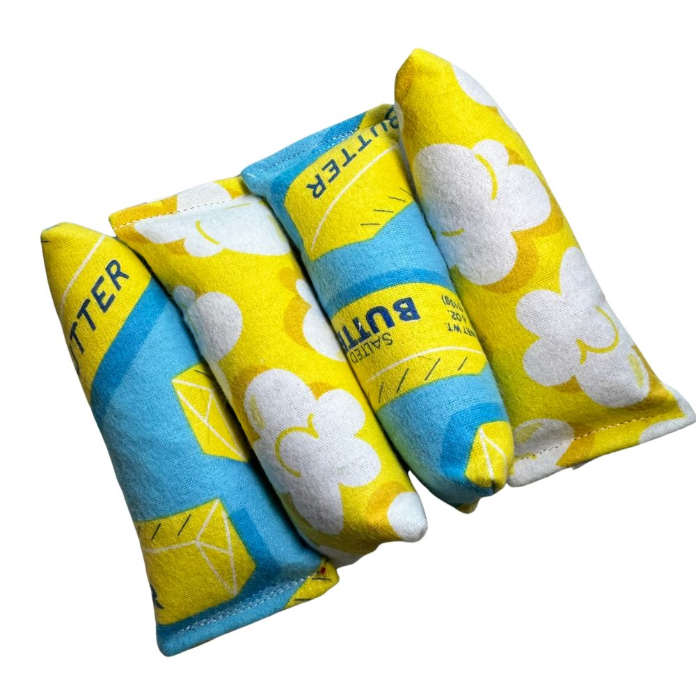 Handmade catnip mini kicker cat toys in popcorn and butter fabric, soft flannel toys sized for smaller kicks, batting, and energetic interactive play by CatnipTakeout