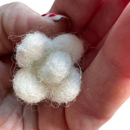 Close-up of popcorn-shaped cat toy sprayed with catnip, showing lightweight texture designed for batting and independent play by CatnipTakeout